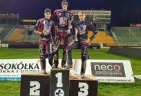 na fot. Podium MIMW. Sebastian Szostak (II miejsce), Marcin Kościelski (I miejsce), Kamil Nowacki (III miejsce) / fot. facebook Marcin Kościelski Racing